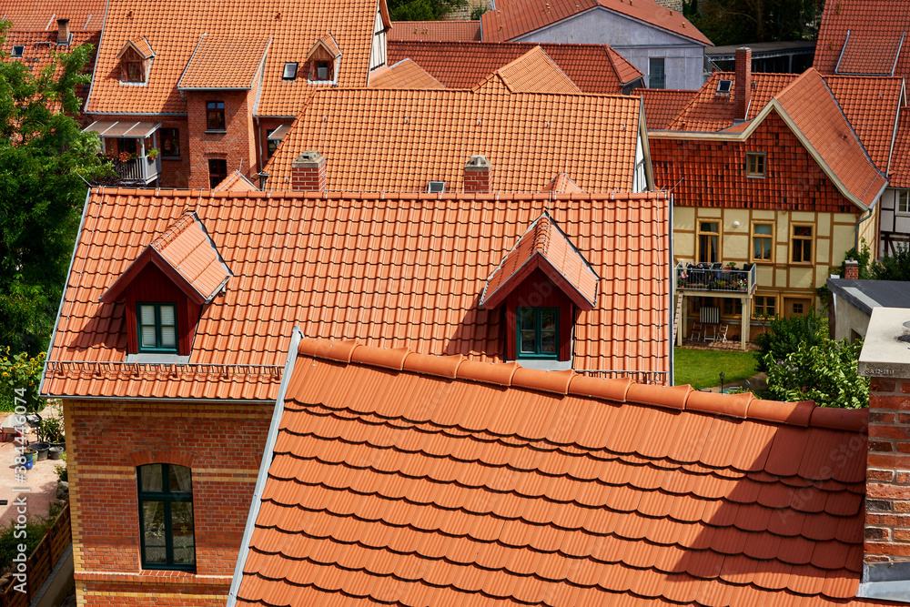top view on medieval town with red roof tiles