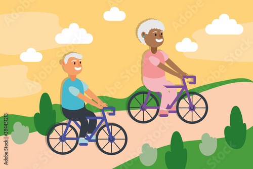 interracial old couple riding bicycles active seniors characters