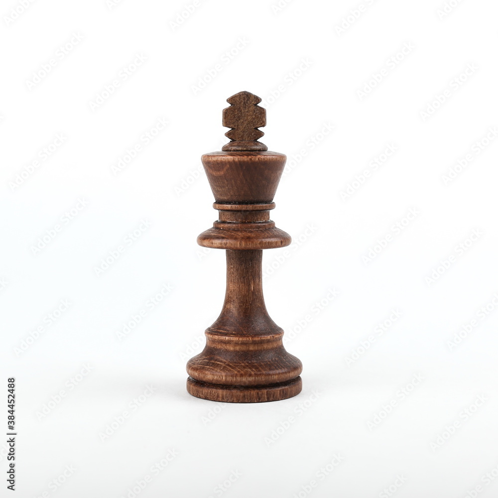 single black chess piece king on white background single black chess piece king on white background