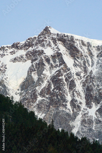 Sunrise on monte rosa and its glaciers, seen from the town of Macugnaga, Italy - July 2020.