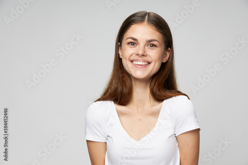 Cheerful woman smile white t-shirt cropped view 