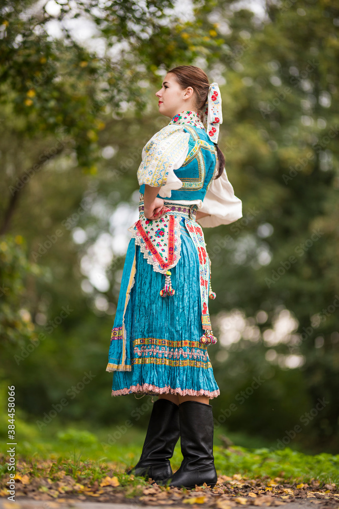 Beautiful young woman in slovak folk dress. Slovak folklore.