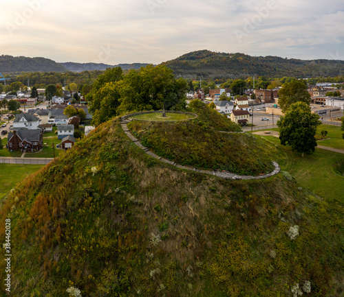 Aerial drone shot of the ancient historic native American burial mound in Moundsville, WV photo