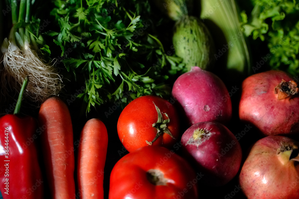 red and green fresh vegetables fruits on blue wood red and green fresh vegetables fruits on blue wood