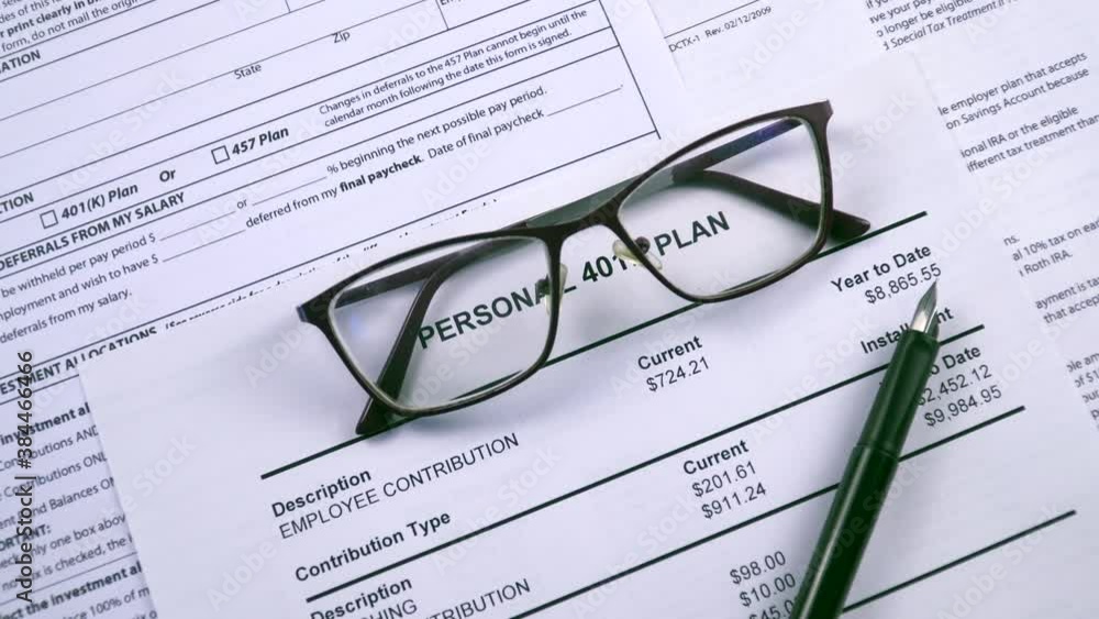 Pension savings. Glasses and pen are on the background sheet Personal 401k plan. Close-up, zoom in shot Pension savings. Glasses and pen are on the background sheet Personal 401k plan. Close-up, zoom in shot