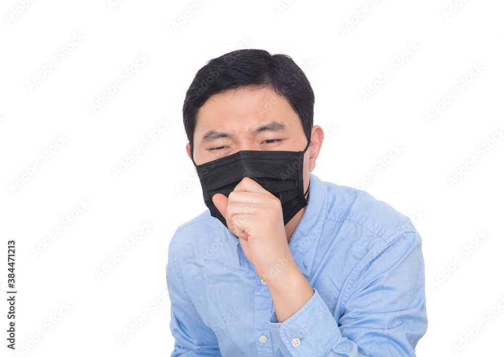 Man wearing a mask coughs vigorously in front of a white background Man wearing a mask coughs vigorously in front of a white background