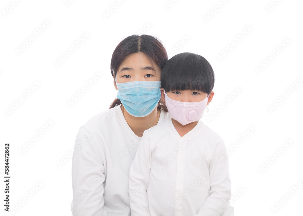 Mom and daughter wearing masks in front of white background Mom and daughter wearing masks in front of white background