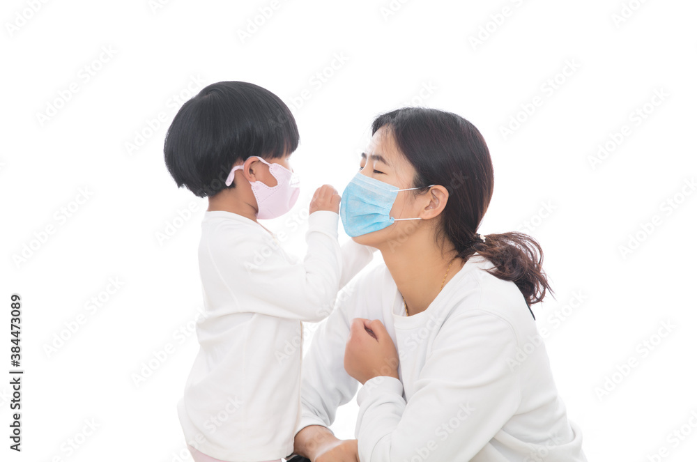 Daughter is helping mother to wear a mask during Coronary Pneumonia Daughter is helping mother to wear a mask during Coronary Pneumonia