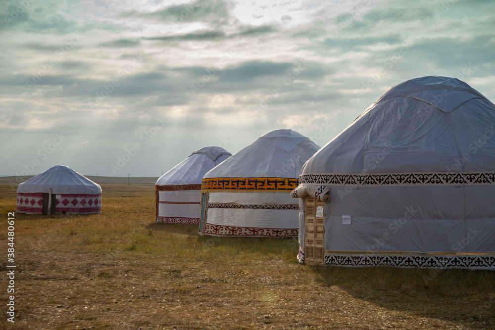 one and several yurts in the Kazakh steppe