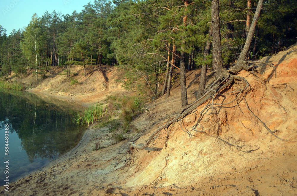 Fototapeta premium Blue Lake in the Chernigow region, Ukraine.Former quarry of quartz sand for glass production.Popular local resort at present