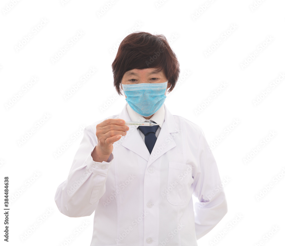 Female doctor wearing a mask checks the clinical thermometer Female doctor wearing a mask checks the clinical thermometer