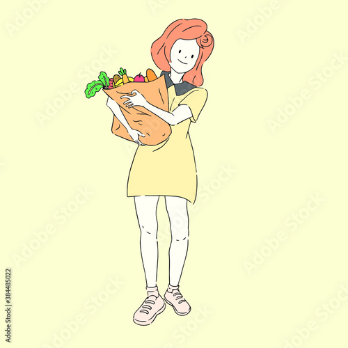 Pretty lady is holding a paper bag which includes vegetables and fruits. 