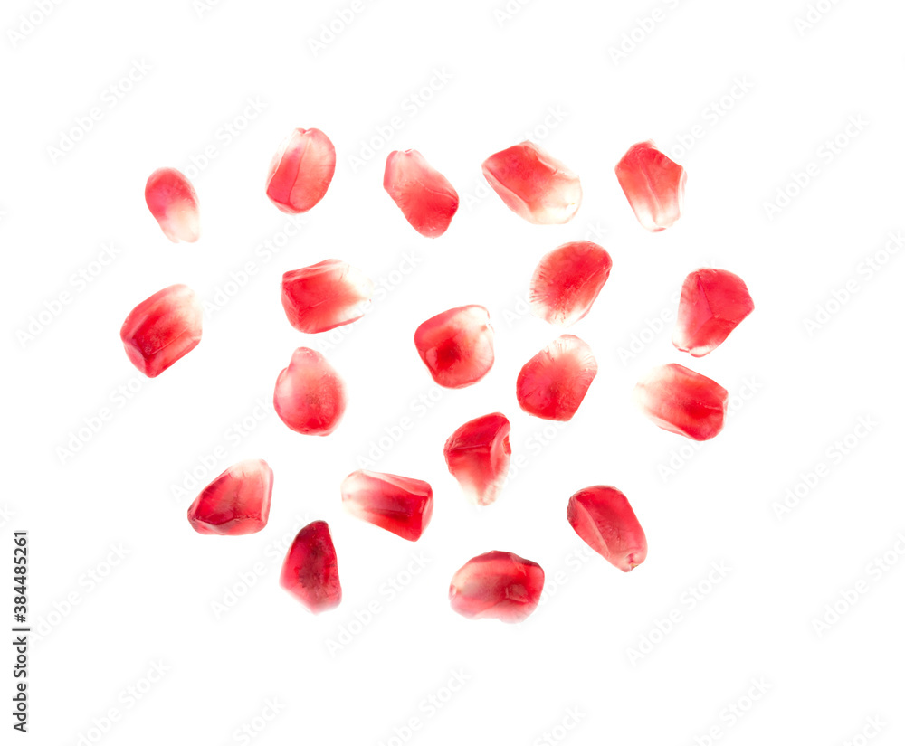 Seeds of pomegranate isolated on white background. Top view. Seeds of pomegranate isolated on white background. Top view.