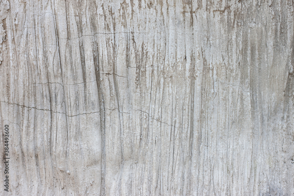 Textured of plastered cement wall is uneven make a strip is design and concept for background. Textured of plastered cement wall is uneven make a strip is design and concept for background.