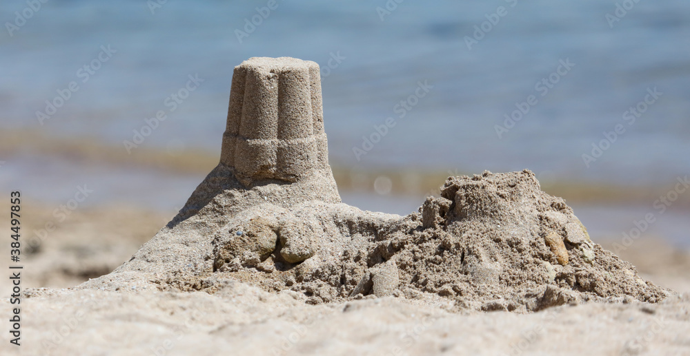 Sand building on the beach