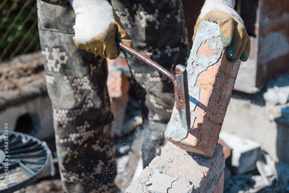 Brick in cement. Remove cement. Breaking down a brick wall. Knocking on