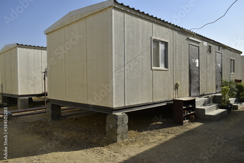 Portacabin, porta cabin, temporary labors camp , Mobile building in industrial site or office container Portable house and office cabins. Labor Camp. Porta cabin. small temporary houses