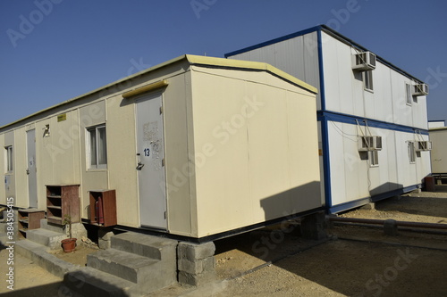 Portacabin, porta cabin, temporary labors camp , Mobile building in industrial site or office container Portable house and office cabins. Labor Camp. Porta cabin. small temporary houses