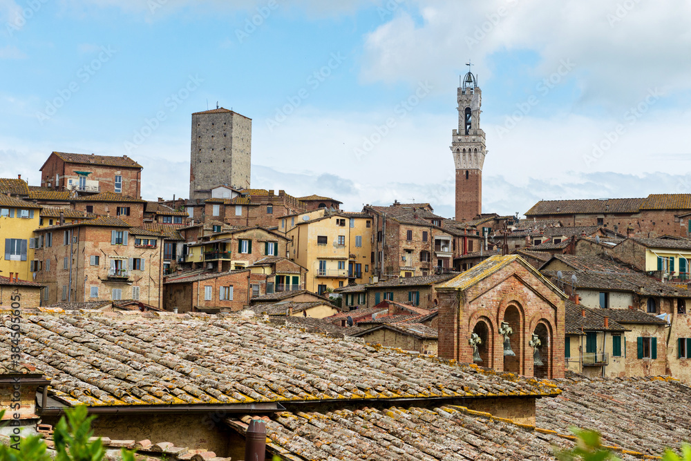 SIENA, ITALY - APRIL 26, 2019: View to the old town in Siena, Italy