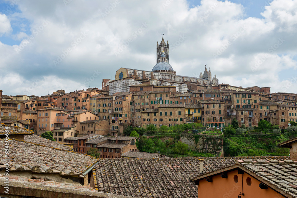 SIENA, ITALY - APRIL 26, 2019: View to the old town in Siena, Italy