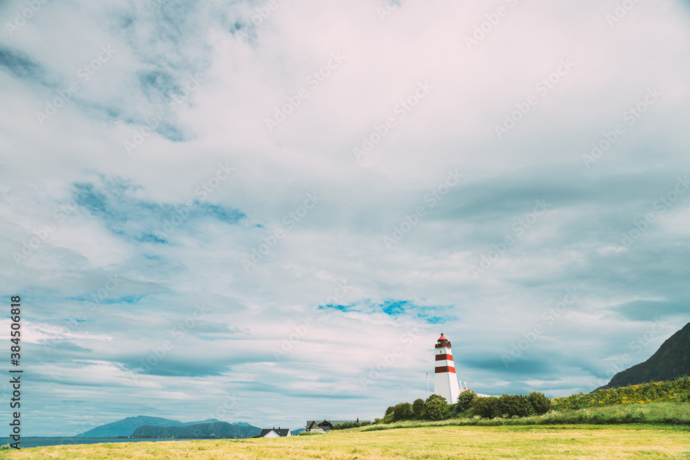 Alnesgard, Godoya, Norway. Old Alnes Lighthouse In Summer Day In Godoy Island Near Alesund Town. Alnes Fyr Alnesgard, Godoya, Norway. Old Alnes Lighthouse In Summer Day In Godoy Island Near Alesund Town. Alnes Fyr