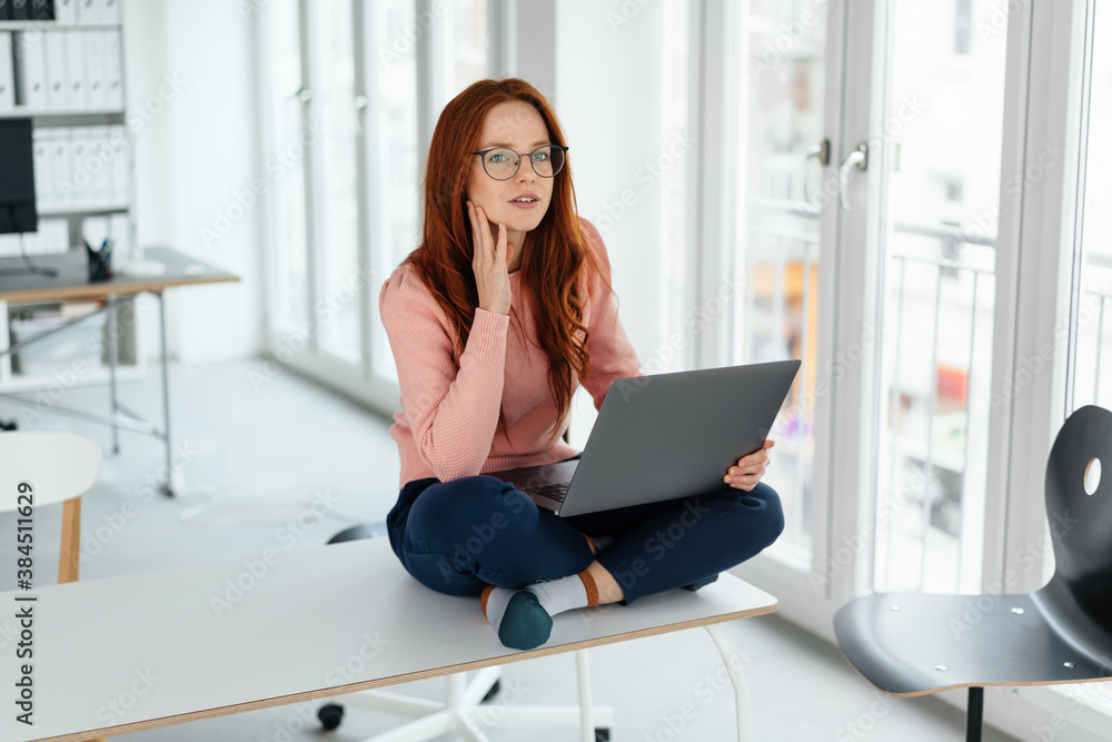 Thoughtful office worker or student with laptop Thoughtful office worker or student with laptop