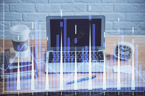 Multi exposure of forex chart and work space with computer. Concept of international online trading. © peshkova