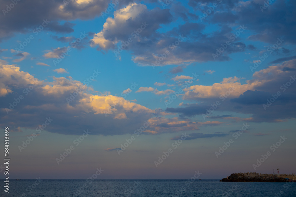 blue cloudy sunset on the beach