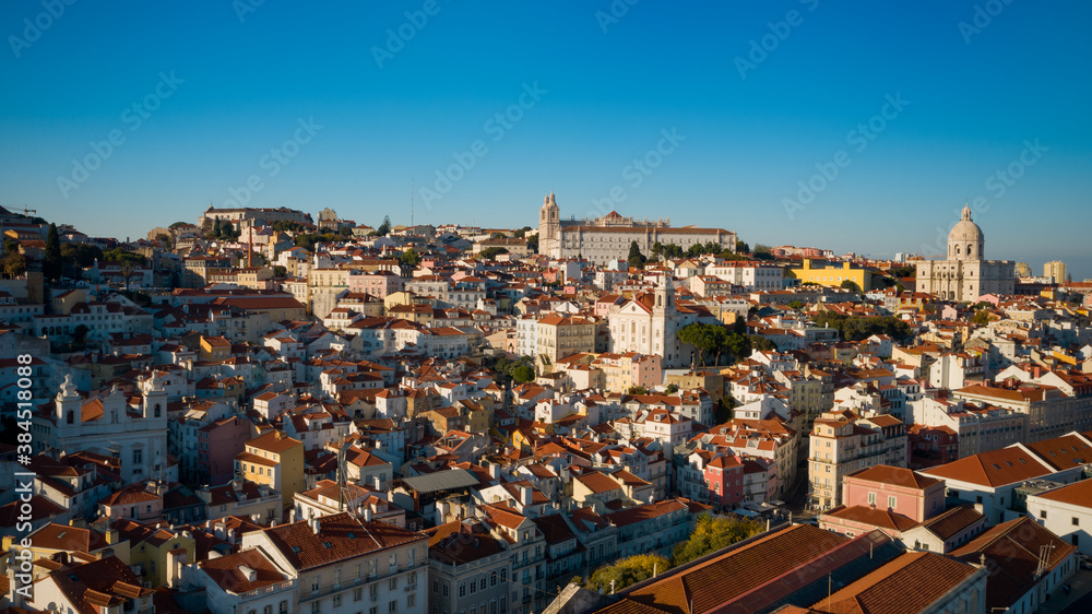 Aerial view or drone sjot of Lisbon old town in sunset.