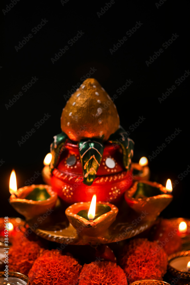 Indian Festival Diwali , oil lamp on dark background