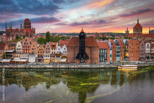 Aerial view of the Gdansk city over Motlawa river with amazing architecture at sunset, Poland