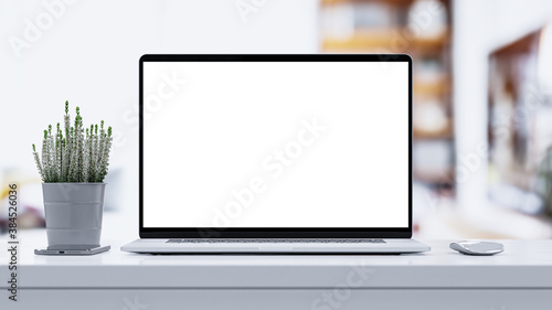 Laptop blank screen on white wooden table with mouse  smartphone and heather flower  3d rendering. Home interior or office background