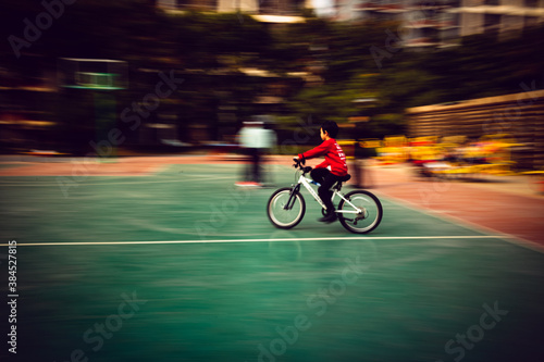 person riding a bike in the city