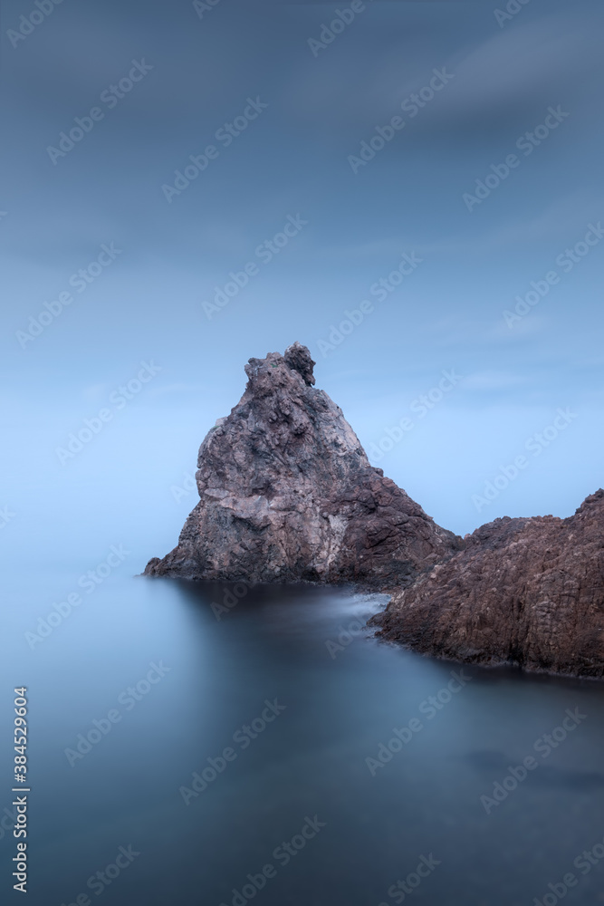 A minimalism rock on the sea