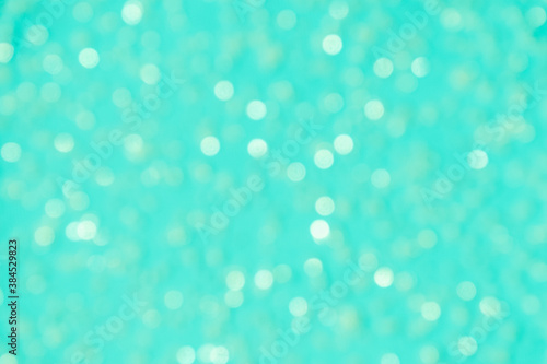 Blurred lights abstract background bokeh white green mint