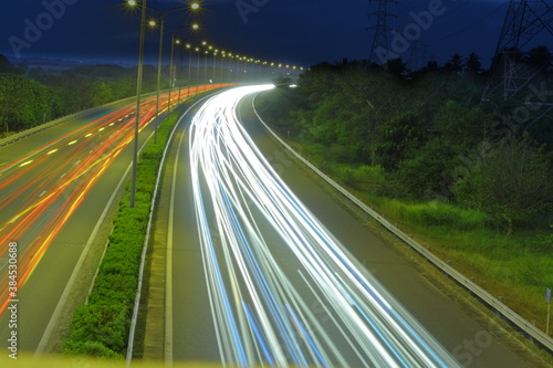 car driving on the highway long exposure 