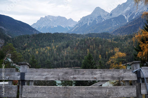 Austrian people and foreign travelers rest and dining at Rasthaus Zugspitzblick restaurant and visit viewpoint of Blindsee lake at Fernpass mountain pass of Tyrolean Alps in Biberwier, Austria