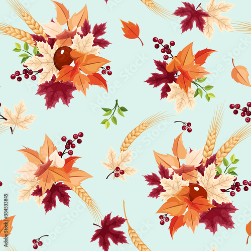 Vector seamless pattern with colorful autumn leaves on a pale turquoise background.