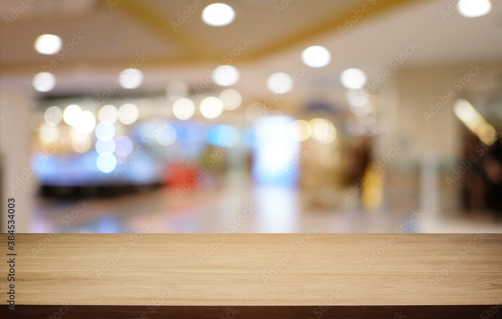 Wood Table Top in Blur Background room interior with empty copy space. Wood Table Top in Blur Background room interior with empty copy space.