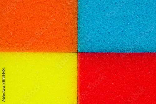 Multi colored sponges for washing dishes. Washcloths.