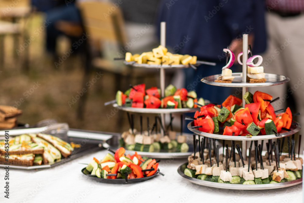 A set of canapes and snack at a banquet with white table