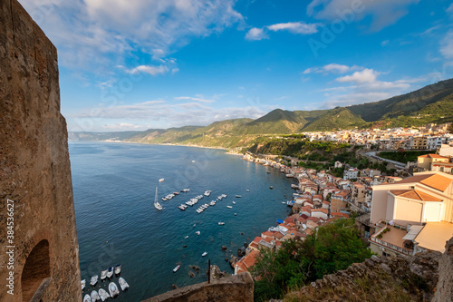 Summer panorama of the village of Scilla (Calabria Region, Southern Italy); here is where Sicily island and the European continent are closest (separated by the Messina strait). Color image. photo