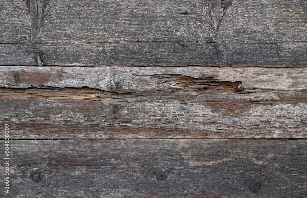Naklejka premium background of old wooden rotten boards 