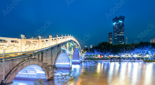 The night view of ancient buildings and modern urban buildings in Nantang Street, Wenzhou