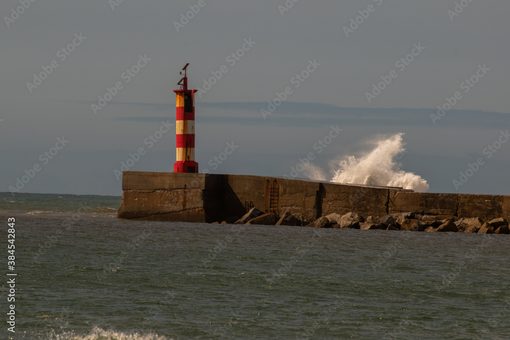 Fototapeta premium Lighthouse and waves