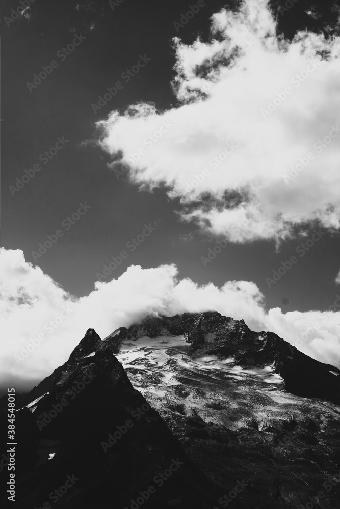 view of the top of the mountain in clouds