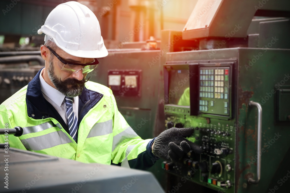 A Engineer inspect or checking or adjust or operate control the machine in workshop factory, the technician repair or maintenance part or equipment A Engineer inspect or checking or adjust or operate control the machine in workshop factory, the technician repair or maintenance part or equipment
