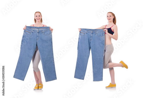 Woman with large jeans in dieting concept