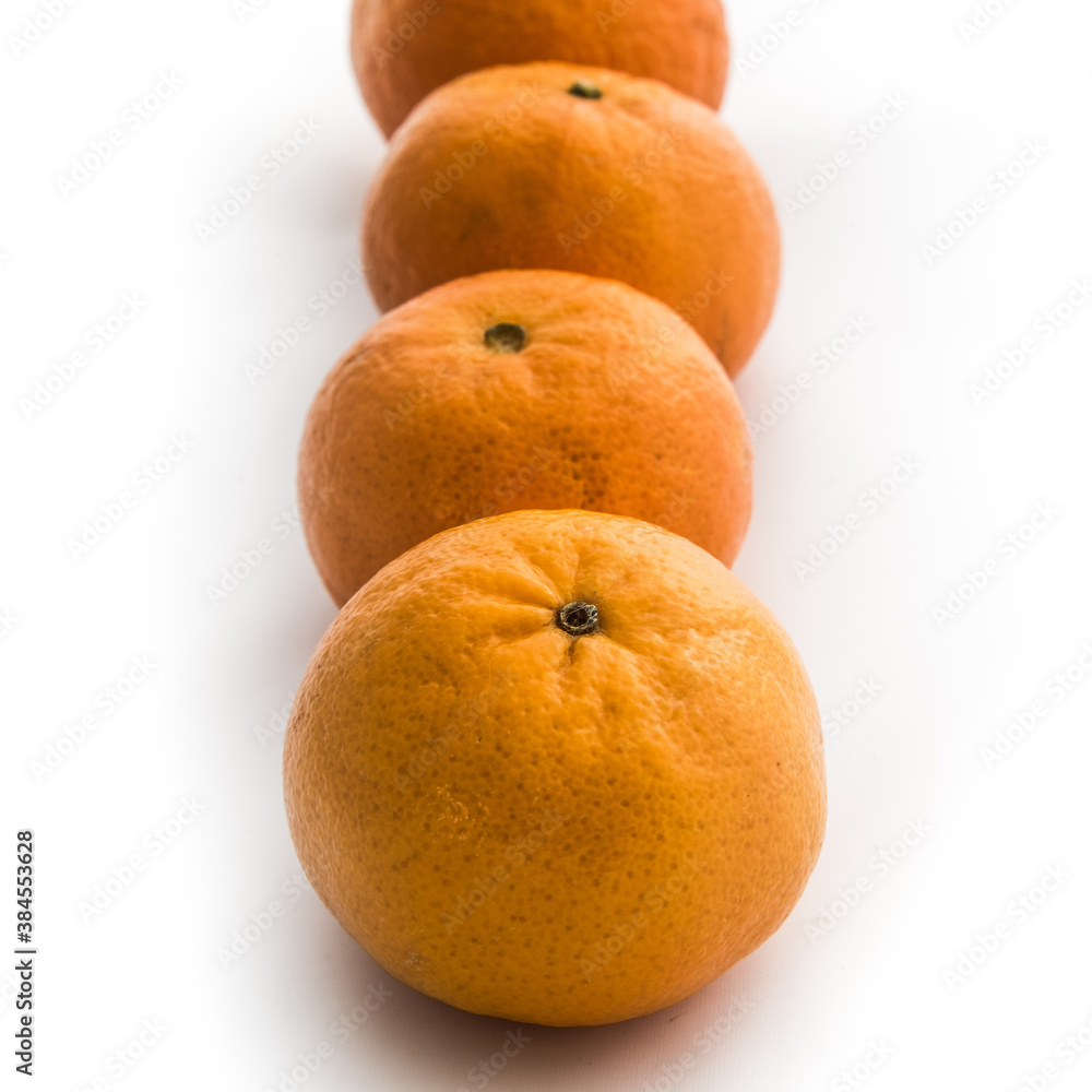 Ripe mandarines isolated on a white background Ripe mandarines isolated on a white background