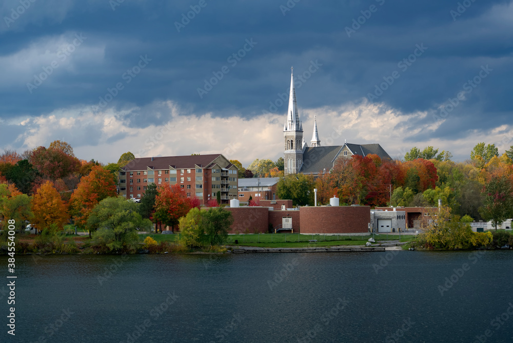 A small town church on a river